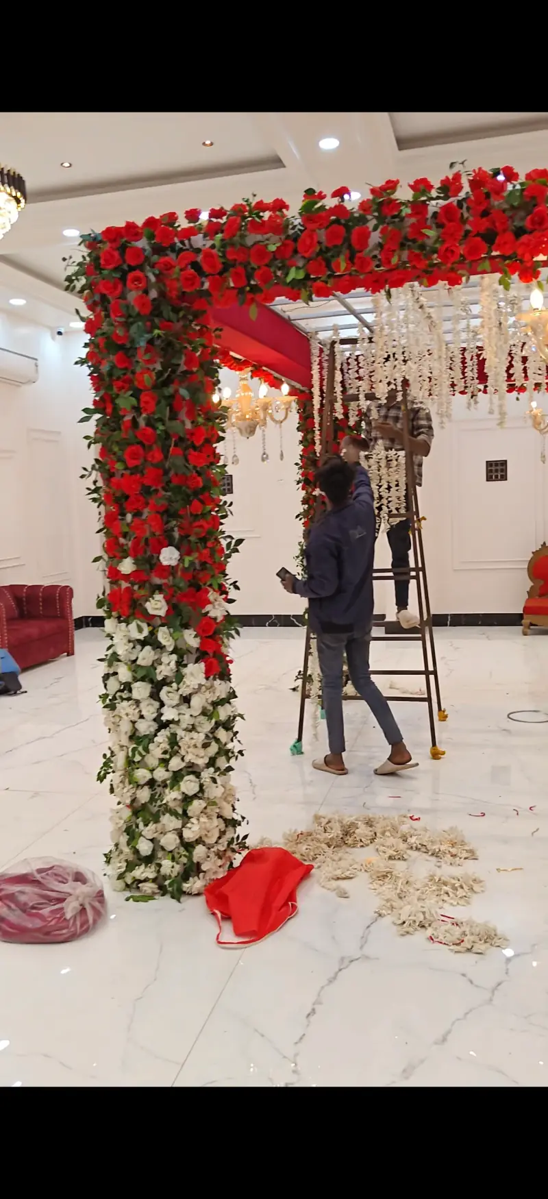 Red rose mandap wide angle with chandelier lighting